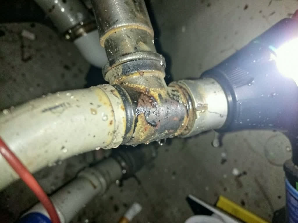 Water droplet on a copper pipe joint