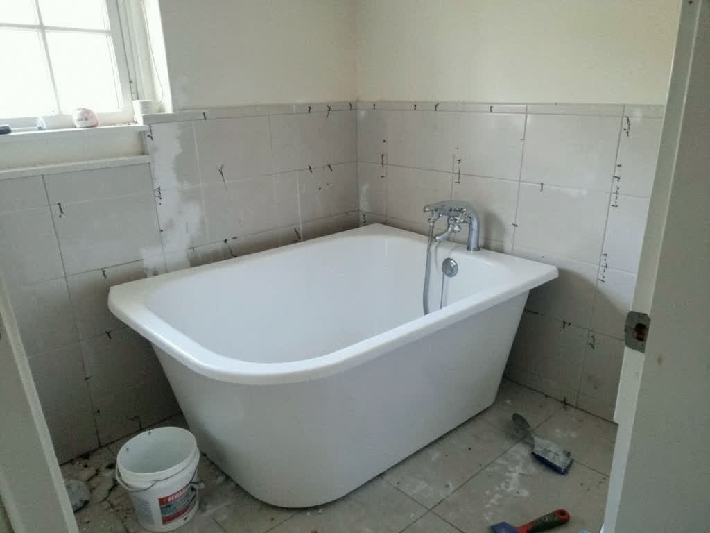 Freestanding tub with gold fixtures